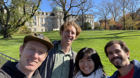 a group of four researchers smiles for a selfie at NYBG